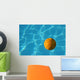 Yellow Waterpolo Ball in Blue Pool Wall Mural