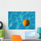 Yellow Waterpolo Ball in Blue Pool Wall Mural