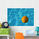 Yellow Waterpolo Ball in Blue Pool Wall Mural