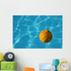 Yellow Waterpolo Ball in Blue Pool Wall Mural