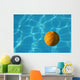 Yellow Waterpolo Ball in Blue Pool Wall Mural