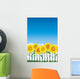 Sunflower behind white fence Wall Mural