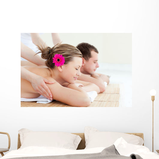 Relaxed couple having a back massage Wall Mural