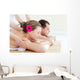 Relaxed couple having a back massage Wall Mural