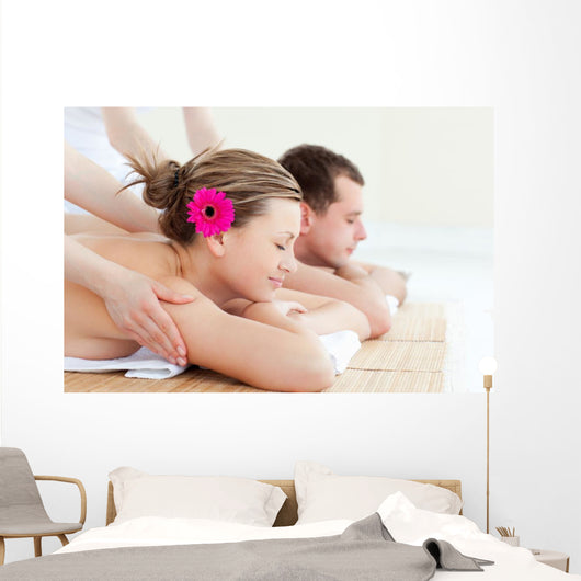 Relaxed couple having a back massage Wall Mural