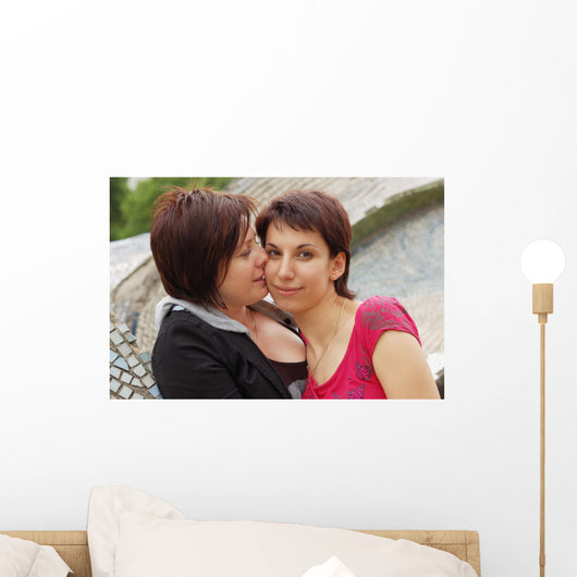 Women Kiss Wall Mural
