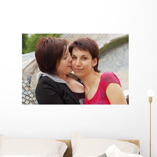 Women Kiss Wall Mural
