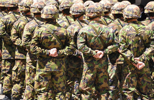 Swiss solders in camouflage Wall Mural