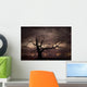 Silhouette of bare tree against sunset Wall Mural