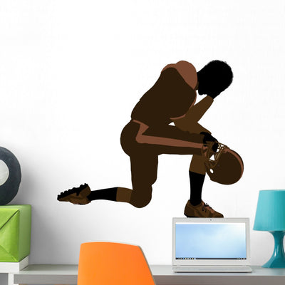 African American Male Football shown on a wall