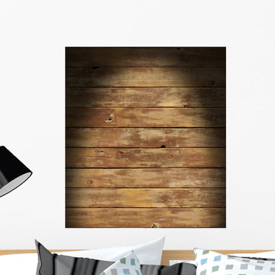 Distressed Wooden Surface Lit Wall Mural shown on a wall