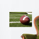 Closeup of American Football on Field Wall Mural