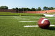 Closeup of American Football  on Field Wall Mural