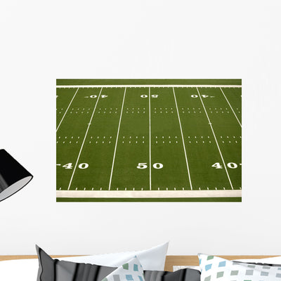 Empty American Football Field Wall Mural shown on a wall