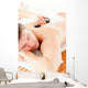 Relaxed Young Man Receiving a Back Massage with Hot Stone Wall Mural