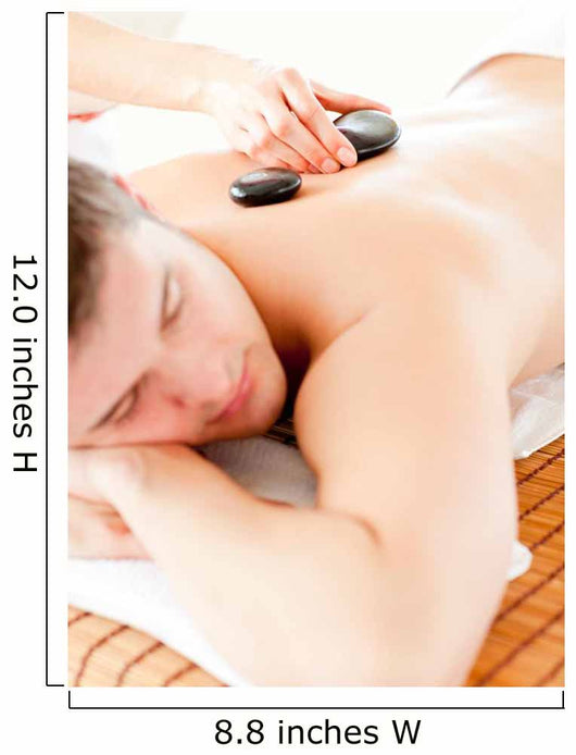 Relaxed Young Man Receiving a Back Massage with Hot Stone Wall Mural