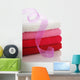 Stack of clean towels and pink ribbon Wall Mural