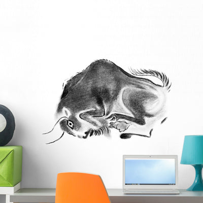 Prehistoric Cave Bull Wall Decal shown on a wall