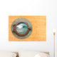 Antique Porthole With View of Crashing Waves Wall Mural