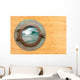 Antique Porthole With View of Crashing Waves Wall Mural