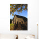 Autumn landscape with barn and goat Wall Mural
