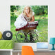 girl with baby buggy Wall Mural
