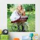 girl with baby buggy Wall Mural