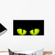 Green cat eyes Wall Mural