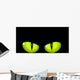 Green cat eyes Wall Mural