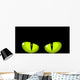 Green cat eyes Wall Mural