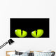 Green cat eyes Wall Mural