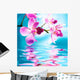 Beautiful orchid flowers reflected in water Wall Mural