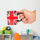 Hand Holding British Mug Wall Mural