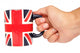 Hand Holding British Mug Wall Mural