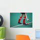 Field hockey girl with stick in hands Wall Mural