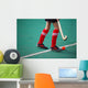 Field hockey girl with stick in hands Wall Mural