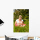 Mother nursing baby on meadow Wall Mural