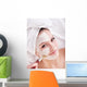 Girl with clay facial mask. Wall Mural