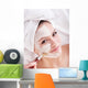 Girl with clay facial mask. Wall Mural