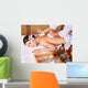 Young woman on massage table in beauty spa. Wall Mural
