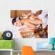 Young woman on massage table in beauty spa. Wall Mural