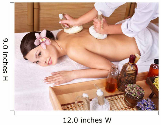 Young woman on massage table in beauty spa. Wall Mural