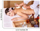 Young woman on massage table in beauty spa. Wall Mural