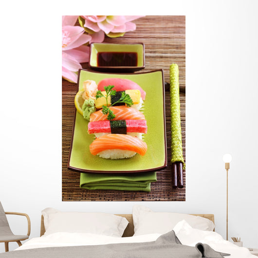 Japan traditional food sushi on green plate Wall Mural