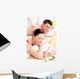 Young Caucasian Couple Receiving a Back Massage Wall Mural