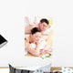 Young Caucasian Couple Receiving a Back Massage Wall Mural