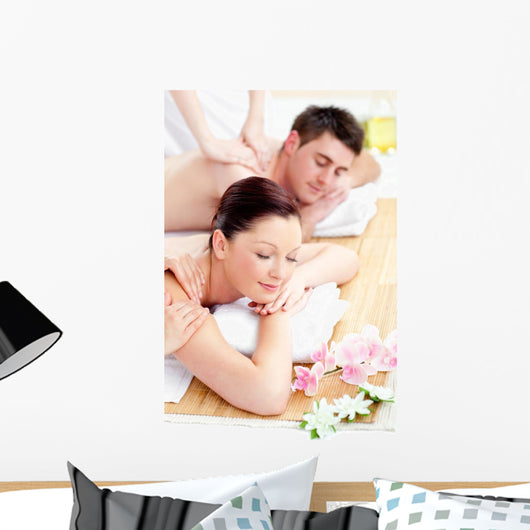 Young Caucasian Couple Receiving a Back Massage Wall Mural