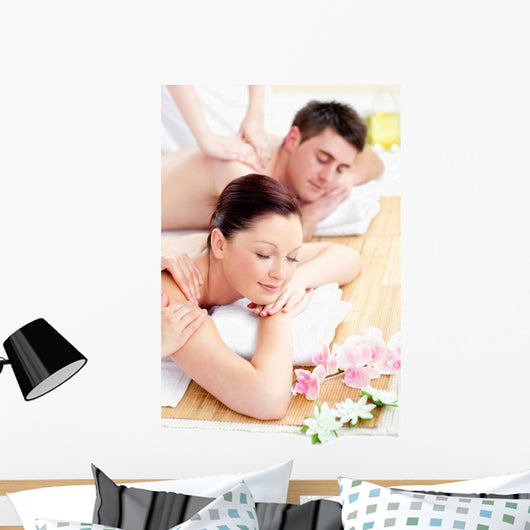 Young Caucasian Couple Receiving a Back Massage Wall Mural