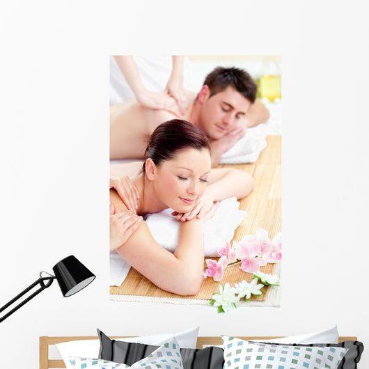 Young Caucasian Couple Receiving a Back Massage Wall Mural