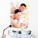 Young Caucasian Couple Receiving a Back Massage Wall Mural